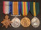 P71 FOUR: 1914/15 Star, British War, Victory, and Territorial Efficiency Medal. First three impressed to 328 ER-S-SJT (PTE on star). J. A. McCOY 11/BN AIF. Efficiency medal impressed 182 DMR J. A. McCOY 20/LOND: REGT