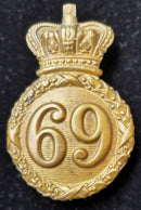 A Scarce Albert Pattern 1844 helmet plate to the 69th South Lincolnshire Regiment of Foot. Complete with both lugs.