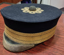 SB41 Royal Army Medical Corps. Attributed to .S. McGlaughlin. Forage cap by Webb & Bonella, 4 Savile Row., London. With chin strap.