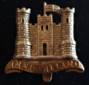 THE INNISKILLING CAP BADGE