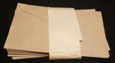 Fifteen R.N.Z.A.F. envelopes produced and sold by the Canteen Board for airmen to purchase to write home with. Still will paper tag to hold bundle together intact and also marked R.N.Z.A.F. with badge (Marked Canteen Board).