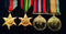 Four : 1939/45 Star, Pacific Star, War Medal 1939/45 and Australian Service Medal 39/45. All medals are correctly impressed to SX39356 L. R. PRINCE
