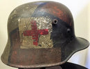An outstanding WW1 Austrian/German M18 camouflage Steel helmet. Typical 3 colour camouflage with black dividing lines. - SOLD