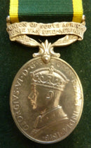 Single : Efficiency Medal 1939 George VI issue, bar "UNION OF SOUTH AFRICA". Impressed to L. CPL. M. P. S. HOLLOWAY, S.A.C.S. GD VF - SOLD
