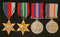 Four: 1939/45 Star, Pacific Star, War Medal and Australian Service Medal 1939/45. 1939/45 and Pacific Stars un-named (as often issued). War and Australian Service medals both officially impressed P A 3164 J. G. SMITH