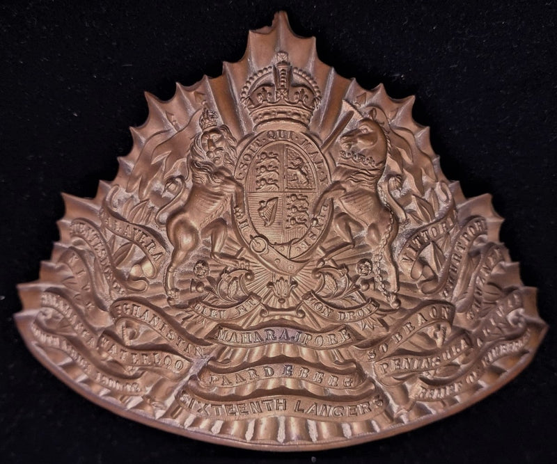 16th (The Queen’s) Lancers other ranks full dress lance cap plate c.1902-14, with Battle Honours to South Africa 1902, with two screw posts.  Good condition.