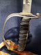 1854 RIFLE OFFICER’S SWORD : 33” blade in vg. condition, profuse etching & fullers to both sides, reverse side marked MOUBRAY, ROWAN & HICKS. MELBOURNE: