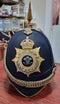 SB27 A North Staffordshire Regiment KC Blue Cloth Helmet. Helmet plate original to helmet. Silk liner still attached to leather sweat band. Complete with velvet lined chin chain. Comes with original storage tin attributed to Lt. R. N. K. Colvill.