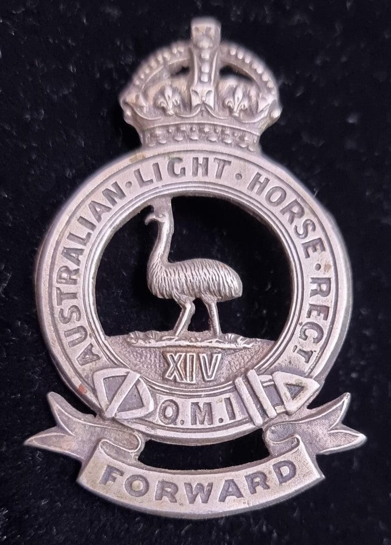 14th Queensland Mounted Infantry white metal hat badge