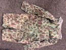 A scarce USMC WW2 frog skin camouflage overalls believed to be used in France during the war.