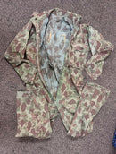 A scarce USMC WW2 frog skin camouflage overalls believed to be used in France during the war.