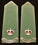 PAIR OF VIETNAM MAJOR’S GREEN SHOULDER BOARDS WITH METAL INSIGNIA INCLUDING AUSTRALIA TITLES