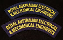 PAIR OF ROYAL AUSTRALIAN ELECTRICAL & MECHANICAL ENGINEERS SHOULDER FLASHES
