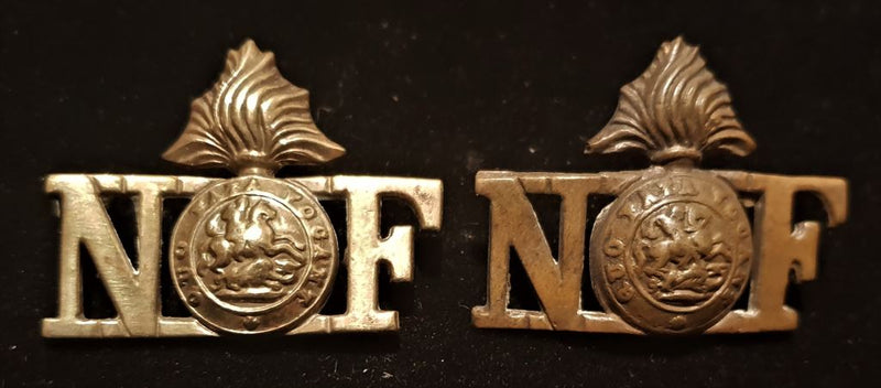 PAIR OF NORTHUMBERLAND FUSILIERS SHOULDER TITLES