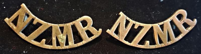 PAIR OF NEW ZEALAND MOUNTED RIFLES SHOULDER TITLES (GAUNT MARKED)
