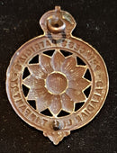 5-2, PRINCESS PATRICIA’S CANADIAN LIGHT INFANTRY “MARGUERITE” CAP BADGE (NORTH SOUTH LUGS WITH ONE MISSING)