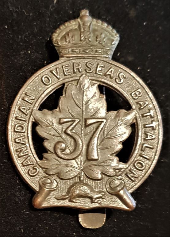 E37 - 37th BATTALION (TORONTO) CAP BADGE(TIFTAFT MARKED)
