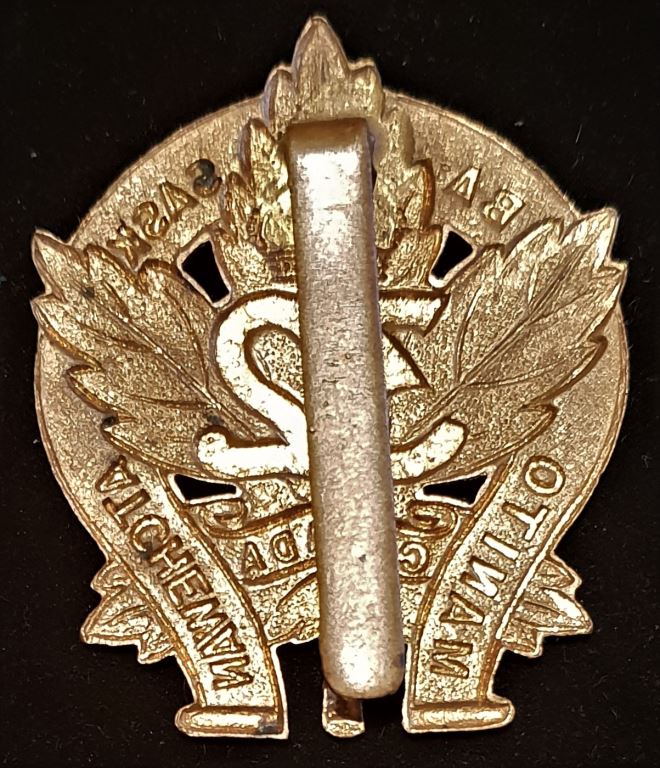 E32 - 32nd BATTALION (MANITOBA / SASKATCHEWAN) CAP BADGE