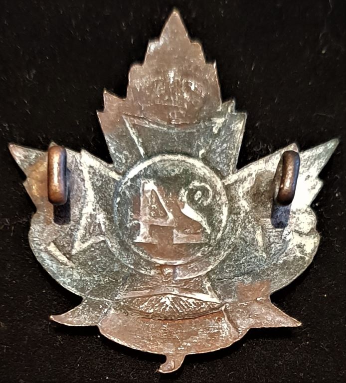 E24 - 24th BATTALION (VICTORIA RIFLES, MONTREAL) CAP BADGE