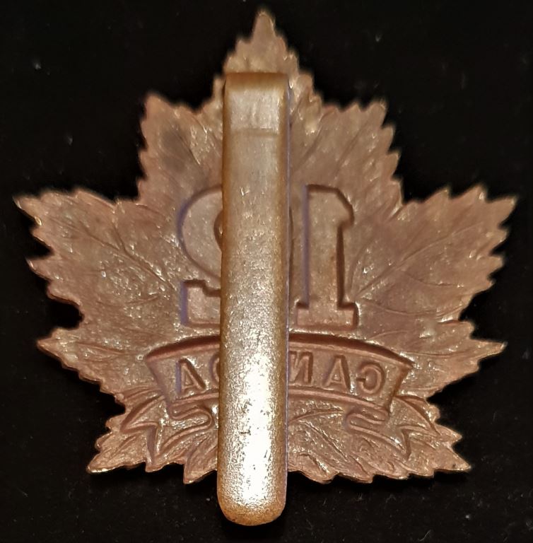E12 - 12th BATTALION (MARITIMES) CAP BADGE