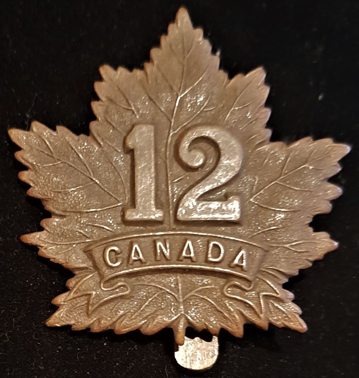 E12 - 12th BATTALION (MARITIMES) CAP BADGE