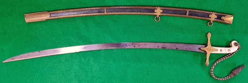 A scarce Cavalry Officers Mameluke Hilted dress sword with blade etched with Kings Hussars and makers details