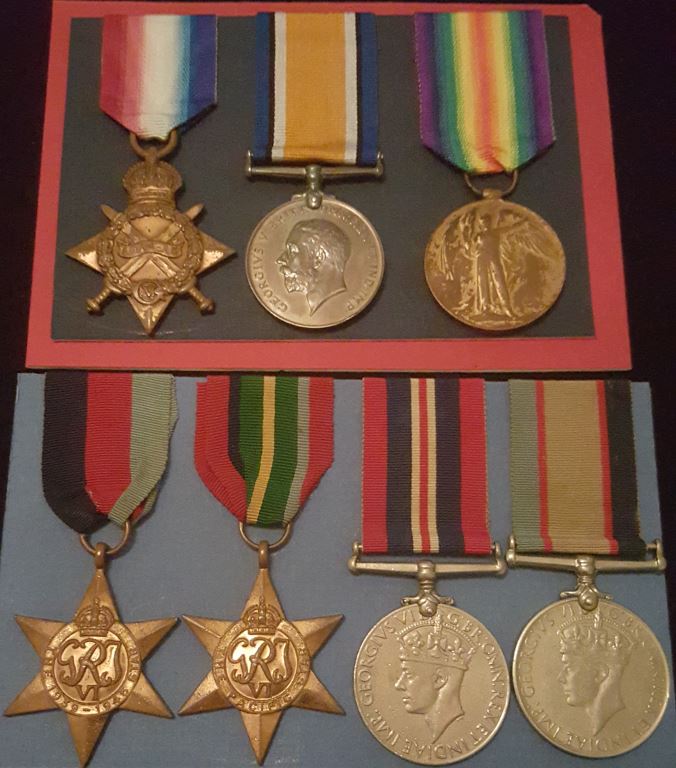 FAMILY GROUPING OF FATHER AND SON    GROUP 1: Trio: 1914/15 star, British War and Victory Medal all correctly impressed to 734 L-CPL (PTE on star). W. CAMERON 22/BN AIF.