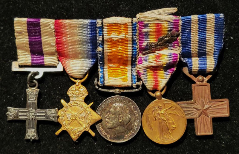 Miniatures Military Cross G.V.R.1914 15 Star British War Medal Victory Medal M.I.D. oak leaf and Italian War Cross bronze