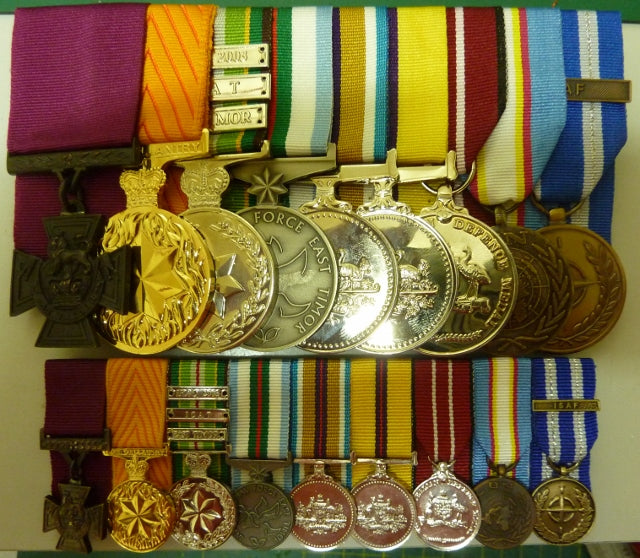 MOUNTING ORIGINAL OR REPLICA MEDALS FOR WEAR FULL SIZE & MINIATURES $20 PER MEDAL WHICH INCLUDES NEW RIBBON AND CLEANING IN THE SERVICE. SUPPLYING REPLICA MEDALS.