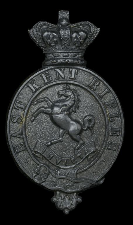 East Kent Rifles Other Ranks Shako Badge c1861-1870. A fine and very rare example in die-stamped blackened metal being a crowned oval strap ‘East Kent Rifles’ - SOLD