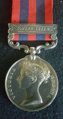 Single: INDIA GENERAL SERVICE MEDAL 1854-95, one clasp "Jowaki 1877-8" impressed naming to 1521 GUNNER C. VERNEY. 13/9th R.A.