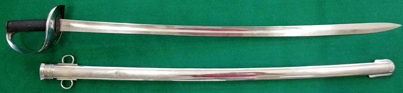 A Scarce Colonial Australian sword being an 1882 pattern British cavalry trooper’s sword and scabbard well marked with impressed numbers and letters N.S.W.G.C over C over 1256 over 00