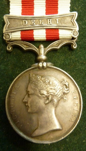Single : INDIAN MUTINY MEDAL 1857 one clasp "Delhi" Impressed B.Cogan 52nd L.I.. The 52nd were in the thick of the fighting at Delhi. - Good VF SOLD