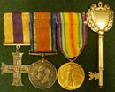 Group of four : MILITARY CROSS G.V.R. British War & Victory Medals plus "Mayor of Exeter" Key 1933. - VF SOLD
