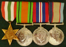 Group of Four : Italy Star, Defence Medal, War Medal 1939/45 and Australian Service Medal 39/45. All medals impressed to 68012 K. E. Mills. - VF SOLD