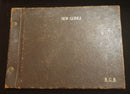 Photograph album containing 79 original WW2 period photos taken in Papua New Guinea. The Album was compiled together by Corporal Raymond George Ball, 6 AA Topographical Survey Coy