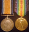 Pair: British war medal and Victory medal impressed to 6983 PTE M. GRIFFIN 2 BN AIF