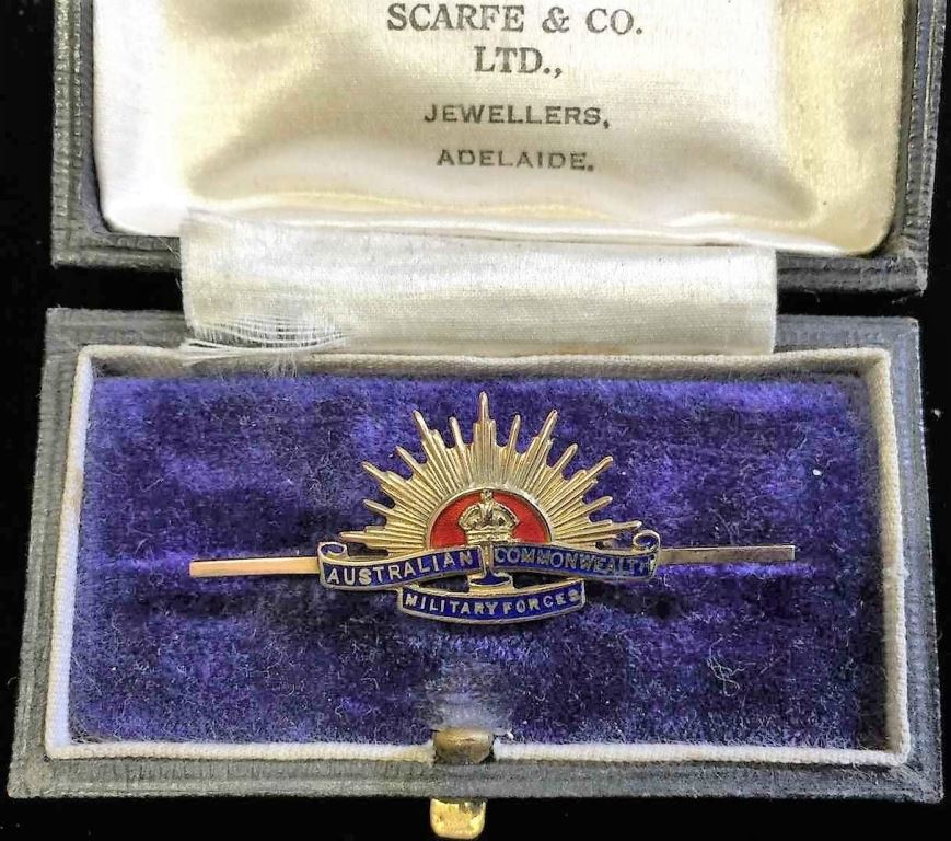 Traditional Rising Sun design marked 9 CT with detailed enamel in 