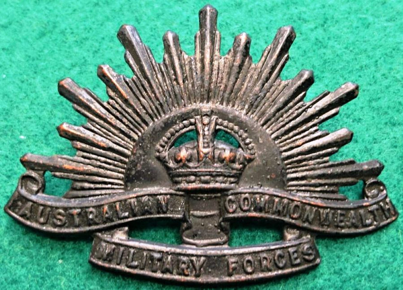 Standard original WW2 Rising Sun with two fixed lugs