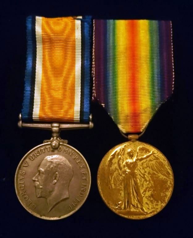 Pair: British war medal and Victory medal impressed to 31148 GNR R. J. WHITE 36 H.A.G. A.I.F.