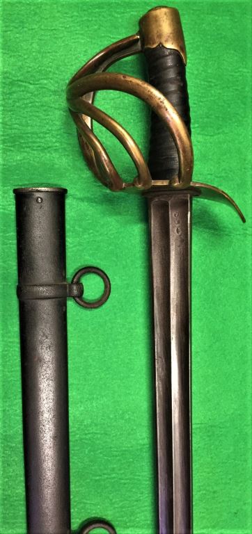 A scarce French XIII Heavy Cavalry sword with full Klingenthal engraved backstrap dated June 1813.