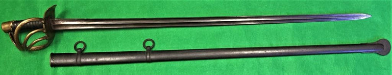 A scarce French XIII Heavy Cavalry sword with full Klingenthal engraved backstrap dated June 1813.