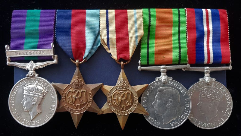 Group of Five: GSM (GV1) One Clasp; "PALESTINE” correctly impressed to 3908856 PTE W. GETHIN S. WALES BORD. 1939/1945 Star, Africa Star, Defence and War Medal unnamed as issued. - VF-EF SOLD