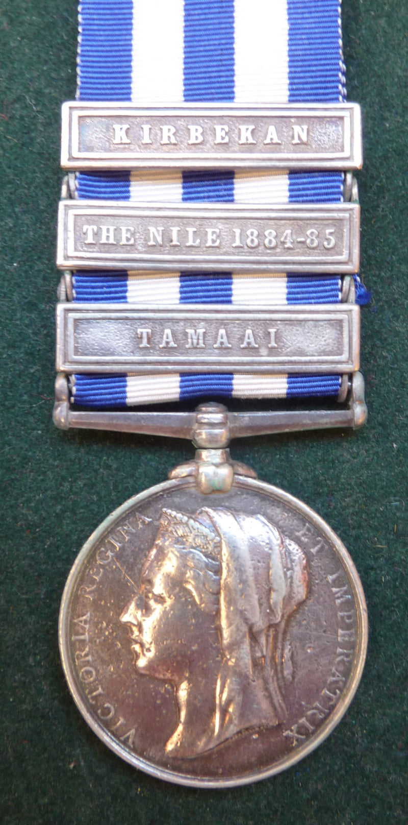 Single: Egypt Medal (undated) three clasps: "TAMAAI, THE NILE 1884-85 & KIRBEKAN" correct period engraved naming to 2452 PTE D. KENEALY 19th HUSSARS. - VF SOLD