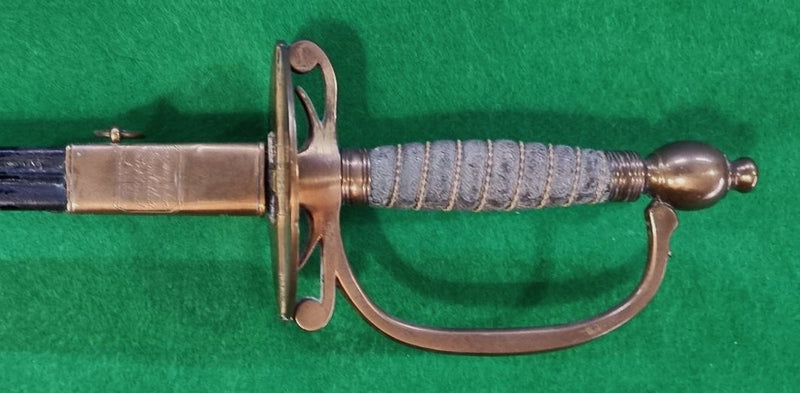 A scarce Royal Naval Pursers sword 1825 pattern engraved on scabbard with makers details Firmin & Sons, sword cutlers, 153 strand, London.