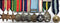 GH16: Nine: 1939-45 Star; Africa Star; Pacific Star (all small impressed) Defence Medal; British War Medal 1939-45; Australia Service Medal; United Nations Korea (all four impressed) Efficiency Decoration (GRI); Greek War Medal 1940-41; VX160 G.F. Sell.