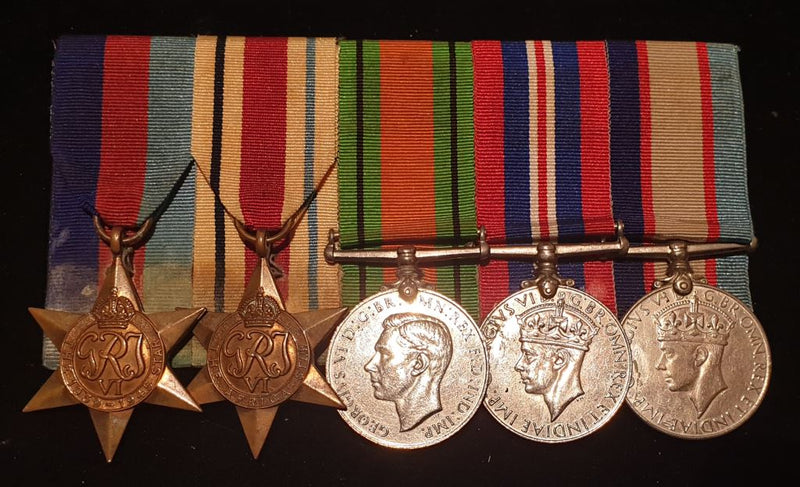 Five: 1939/45 Star, Africa Star, Defence Medal, War Medal and Australian Service Medal. Defence Medal, War Medal and Australian Service Medal all correctly named to WX284 G. J. STRAUGHAN. Stars un-named as often issued. - VF SOLD