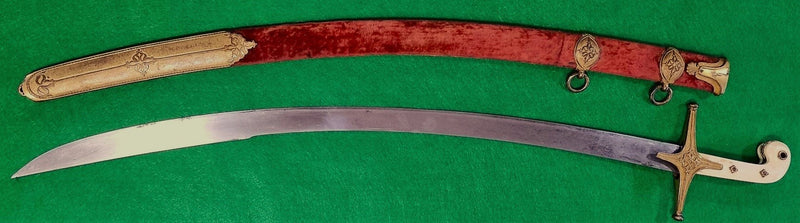 A scarce Cavalry Officers Mameluke Hilted dress sword with blade etched with crossed Lancers over IX Lancers and maker Prosser. The etching is worn but still very readable.