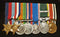 1939/45 Star, France & Germany Star, Defence & War Medals, George VI Jubilee Medal, Territorial Efficiency Medal (GVI) and bar, correctly named 2570052 SIGMN. V. R. PAIN. SIGNALS; - GD VF SOLD
