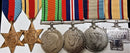 Five: 1939-45 & Africa Stars, Defence, War & Australian Service Medals. ALL impressed. SX1984 R. E. Williams 2/10 Infantry Battalion. Comes with an engraved Tobruk Medal.